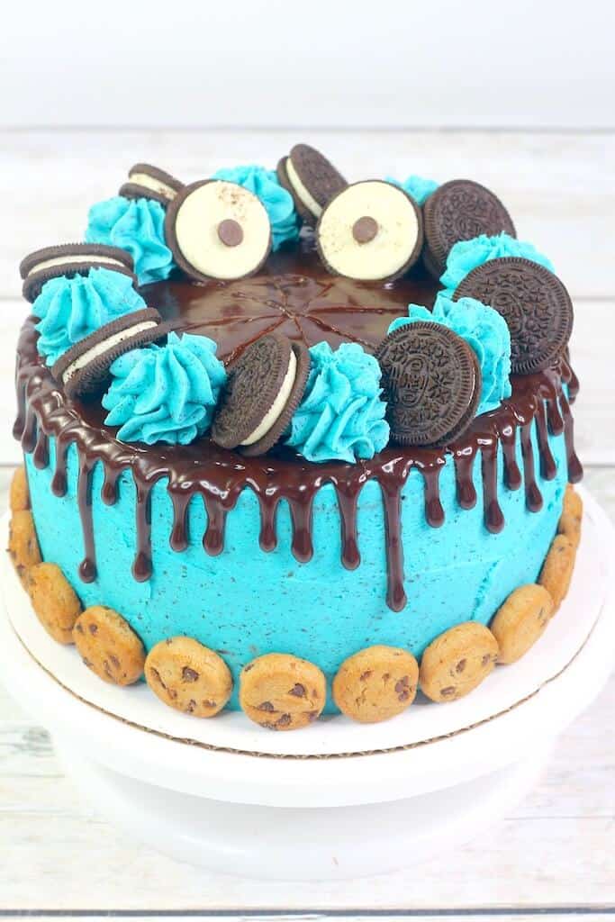 cake filled with cookie dough and cookies all around