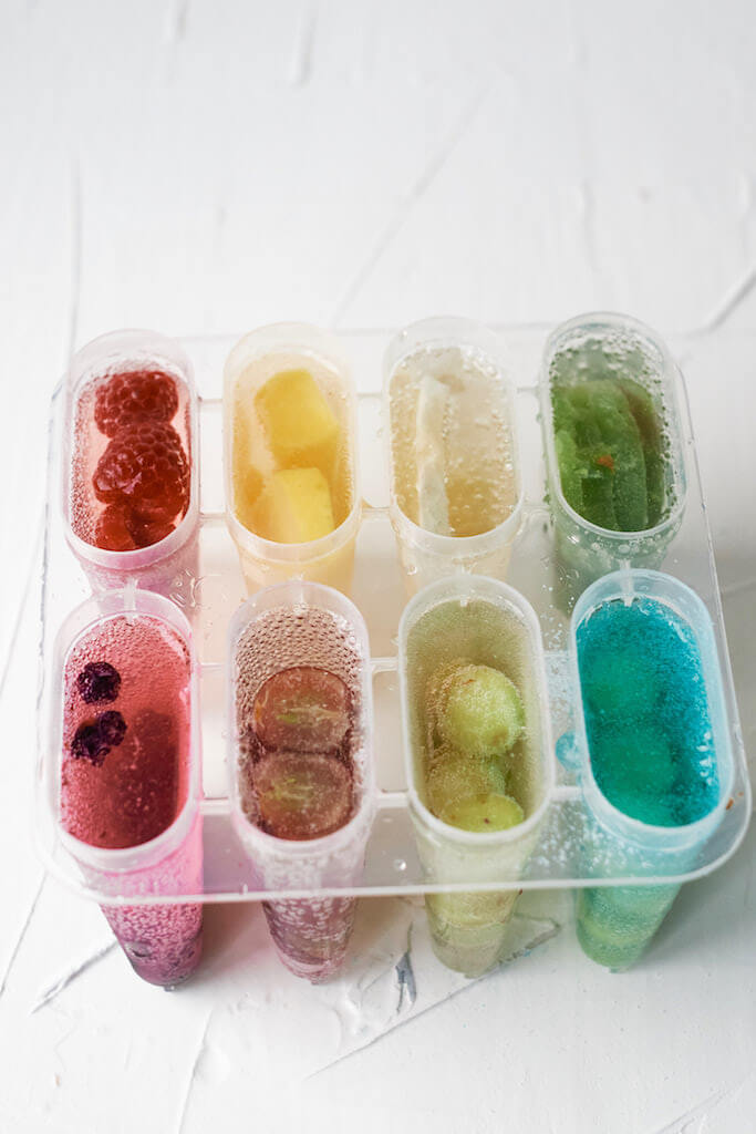 popsicle ingredients in popsicle molds.
