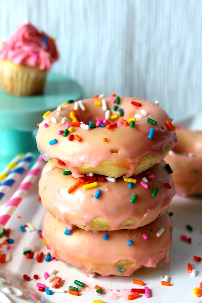 donut stack with funfetti sprinkles and pink frosting 