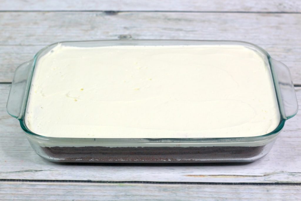 cake with frosting in pan