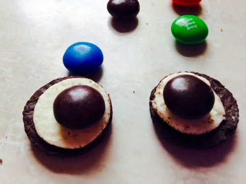 m&m's on center or Oreo to create eyes.