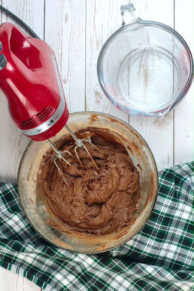 cake mix in bowl with mixer
