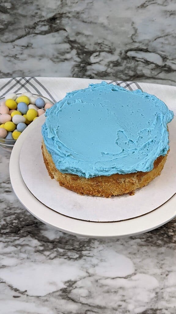 cake with blue frosting on top