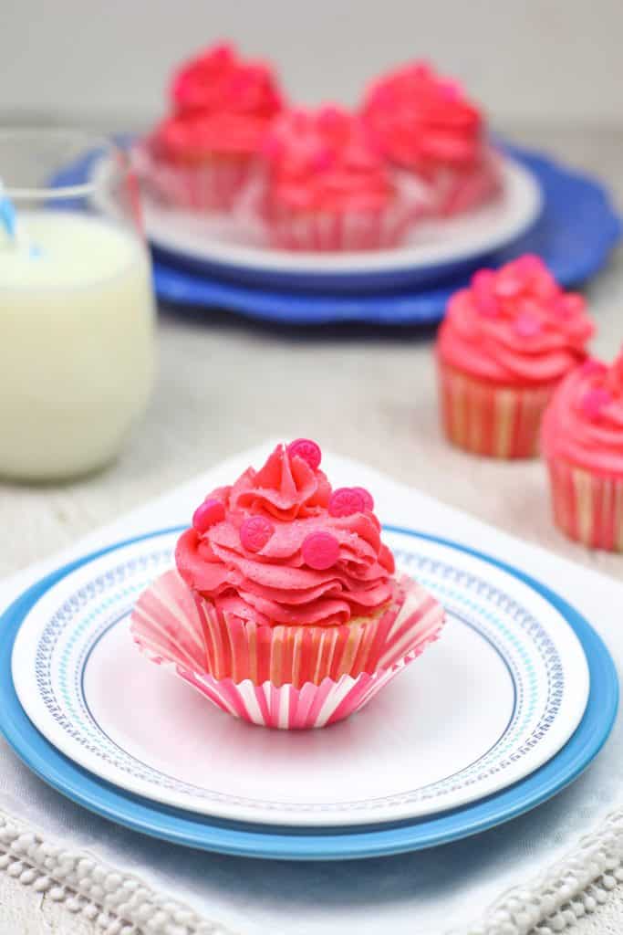 Pink Grapefruit Soda Cupcakes with Buttercream Frosting close up. 
