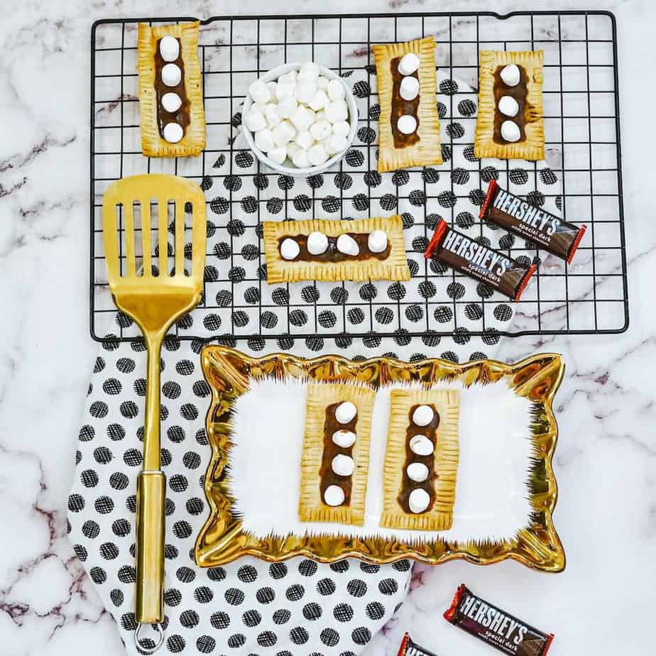 Air Fryer S’more Pop Tarts on a plate and cooling rack.
