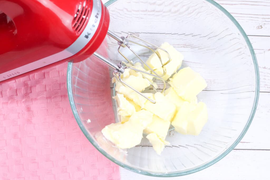 mixing butter in a bowl.
