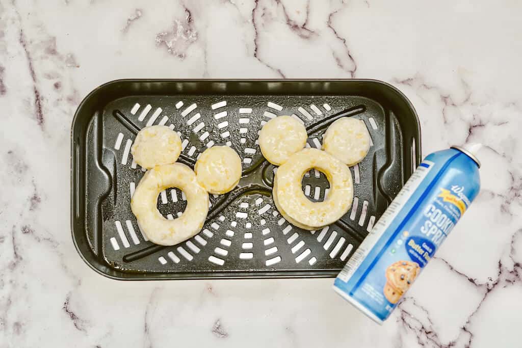 donut dough shaped into Mickey Mouse. 
