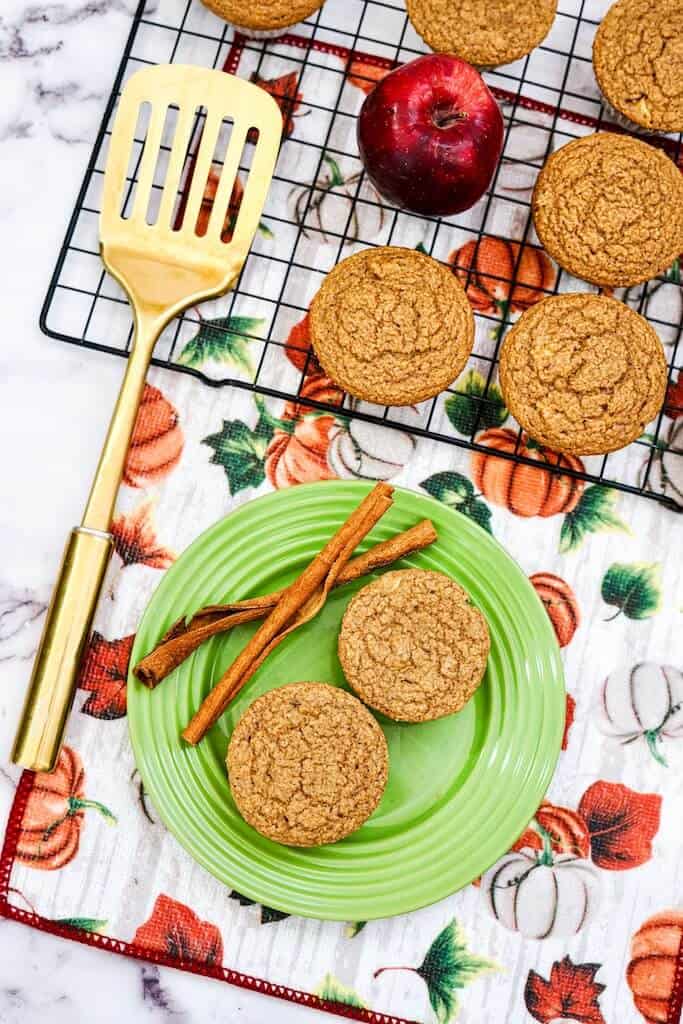 Apple Spice Muffins on a cooling rack.