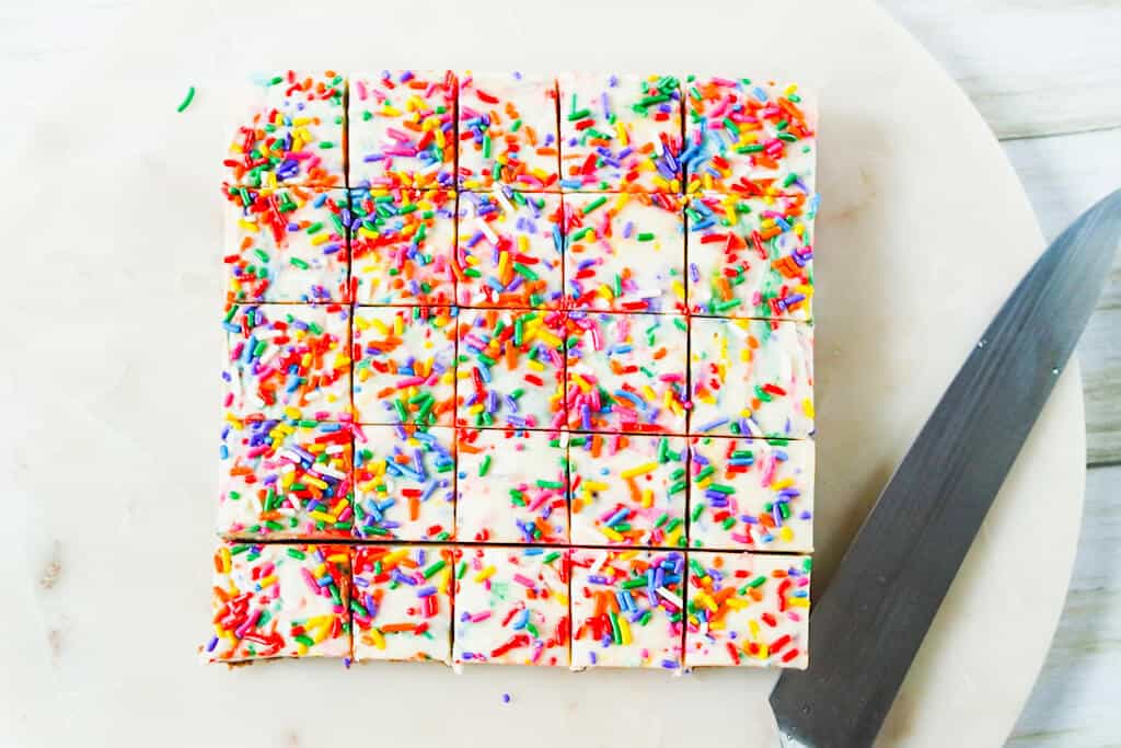birthday cake fudge cut into square pieces. 