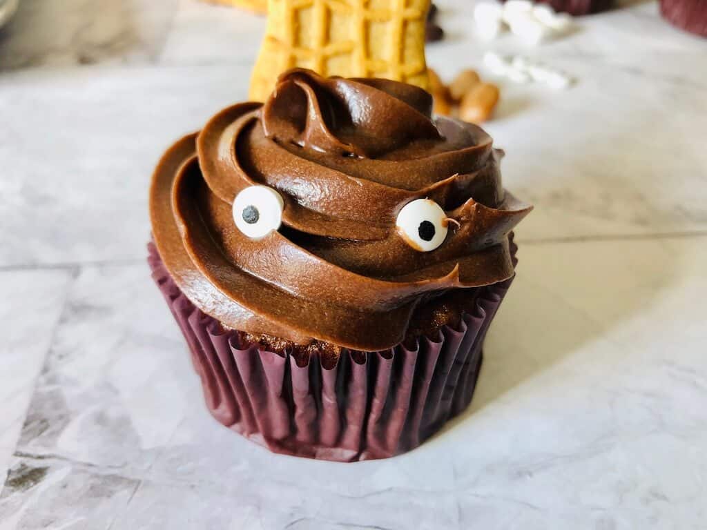eyes added to beaver cupcake.
