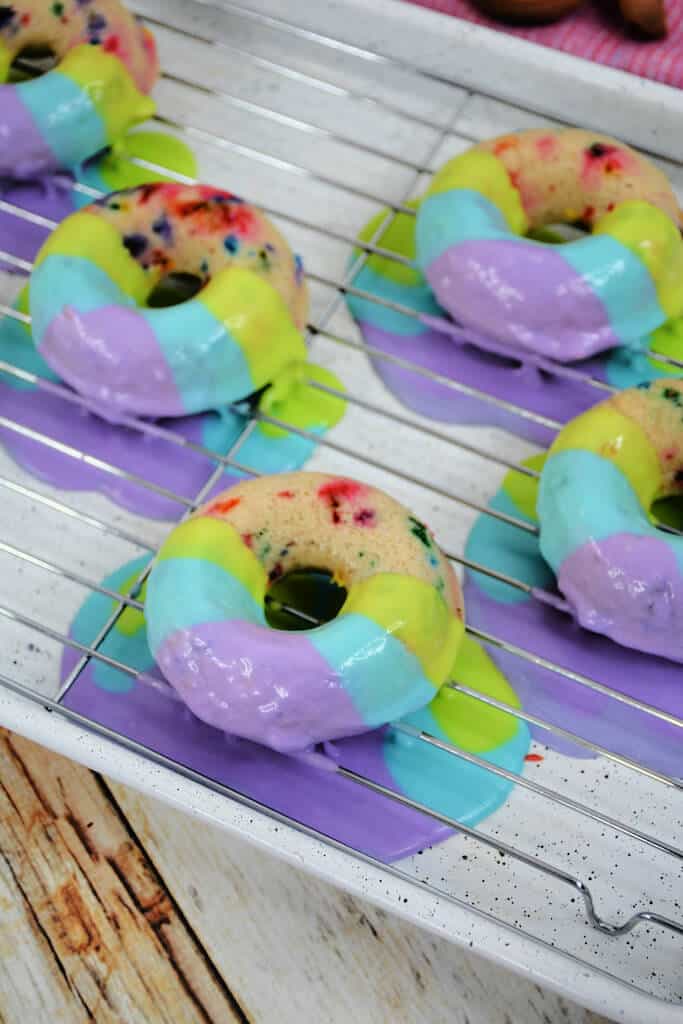 rainbow frosting on donuts.