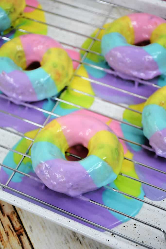 rainbow frosting on funfetti donuts.