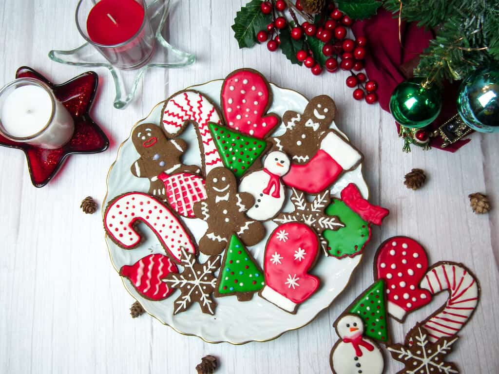 Christmas gingerbread cookies in multicolor on a plate.