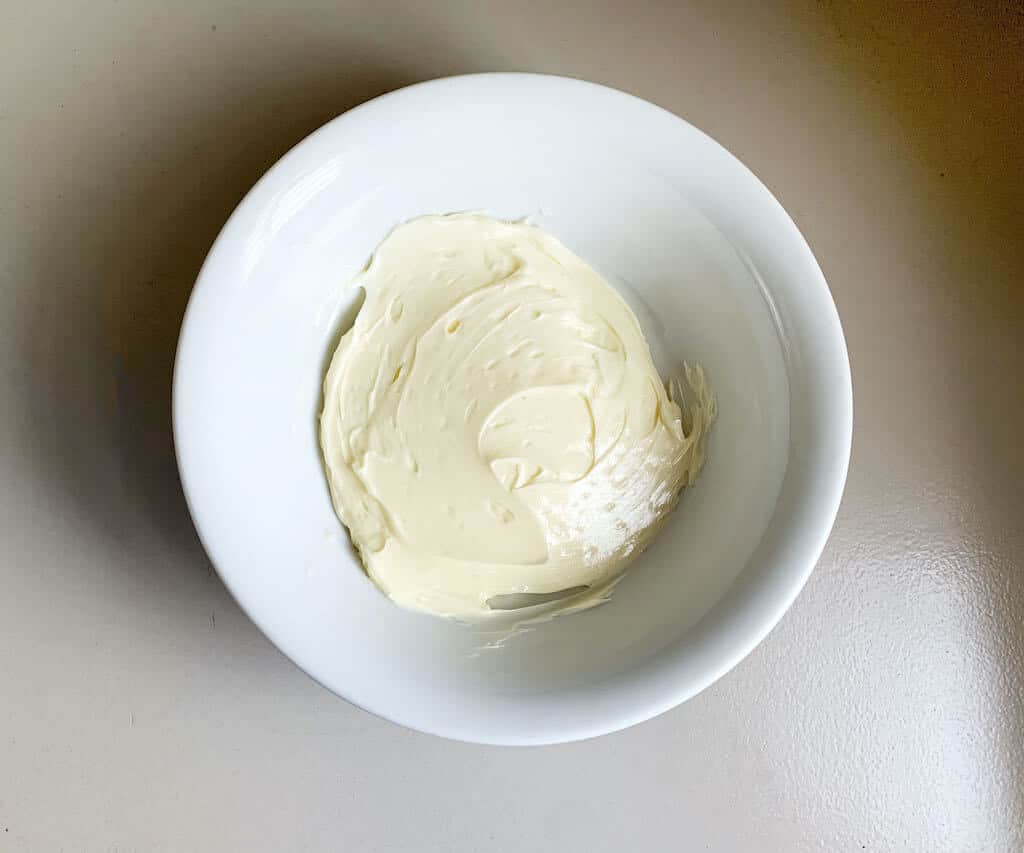 Butter at room temperature in a bowl.