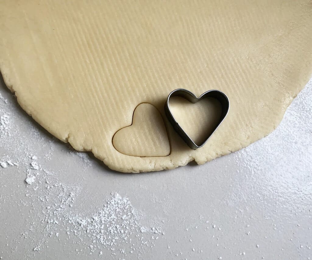 Rolled cookies dough to make and cut into heart shape.