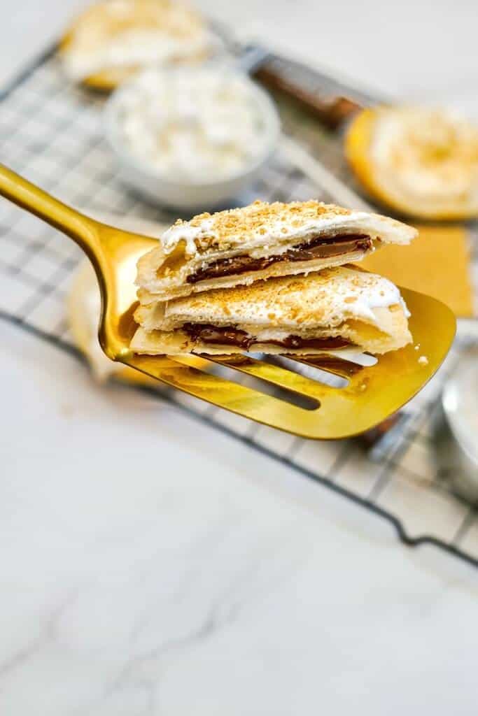 Fried pieces of air fryer s’mores pie pops.