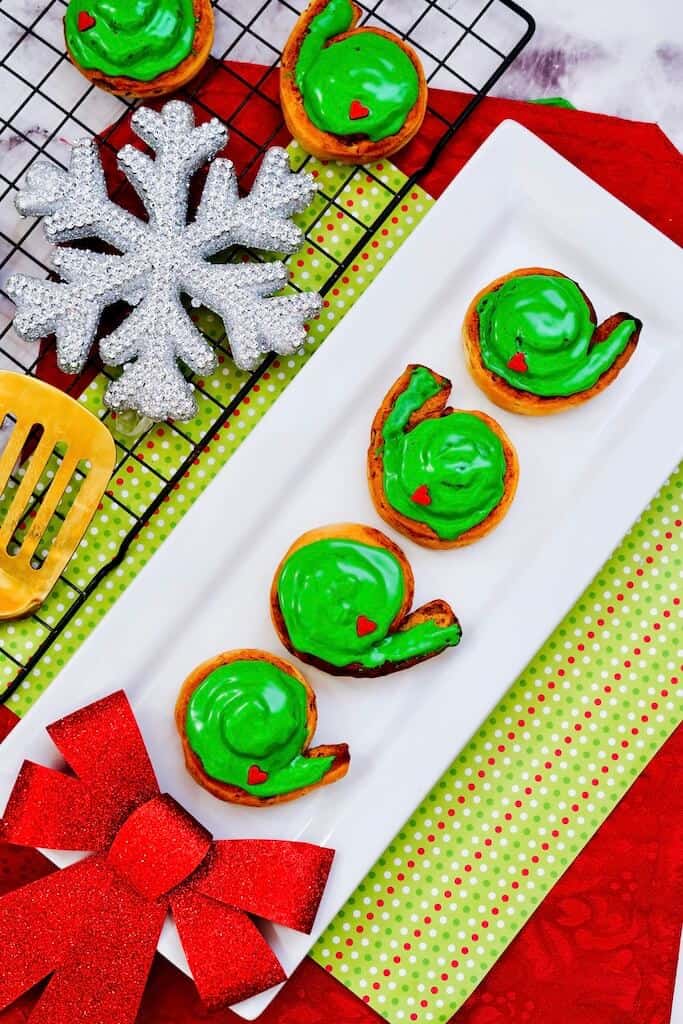 Grinch cinnamon rolls with green food coloring.