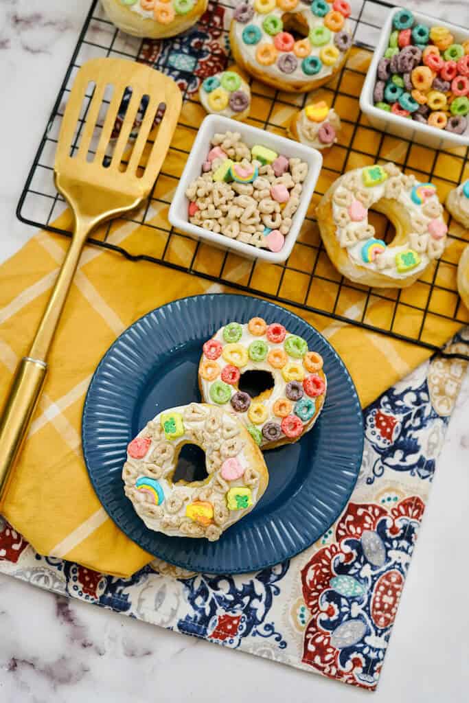 lucky charm donuts on a plate.
